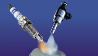fuel injector and spark plug ignite fuel mixture